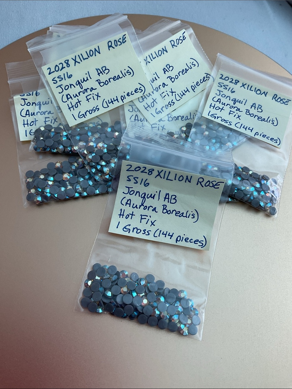 Swarovski • Color: Jonquil Aurora Borealis, 2028 XILION Rose Hotfix Rhinestones
